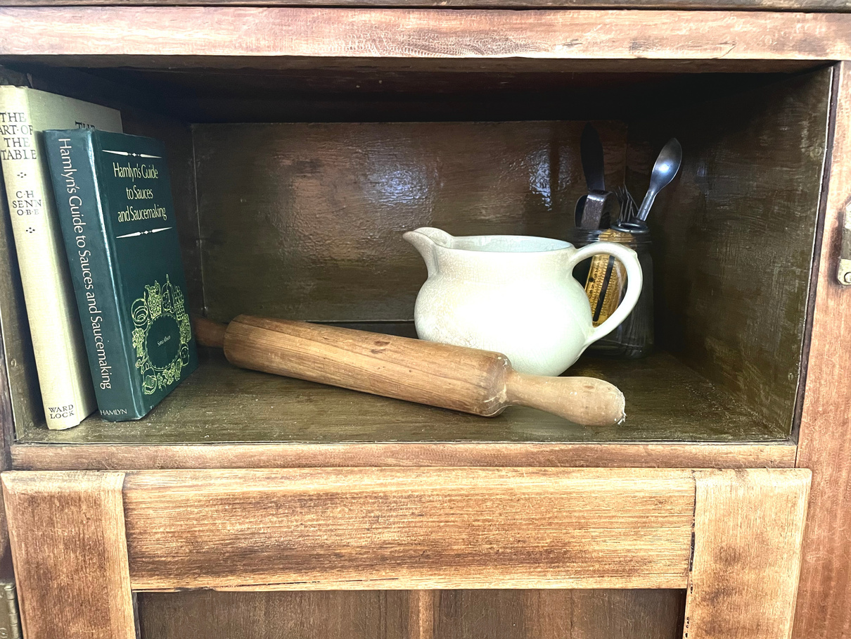 Antique kitchen books and utensils